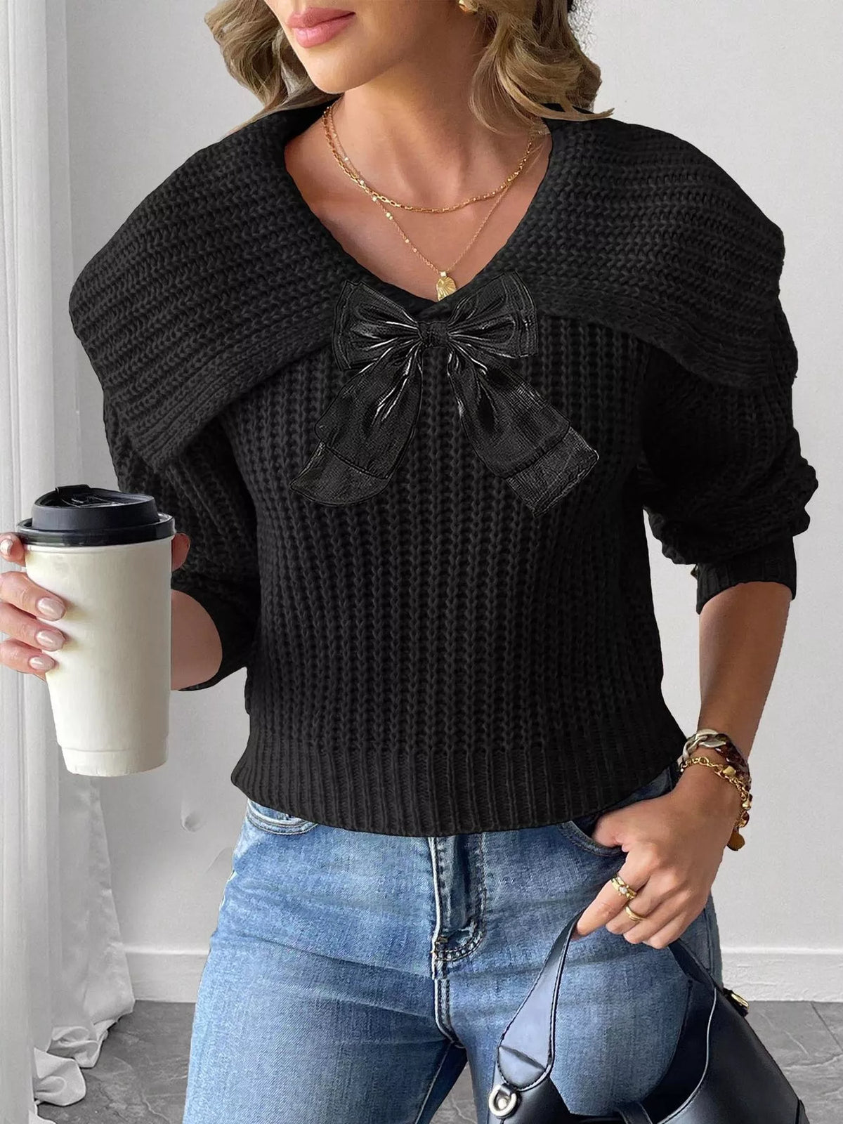 Contrast bow long sleeve sweater paired with a stylish skirt, featuring a trendy design and soft fabric from Trendsi.