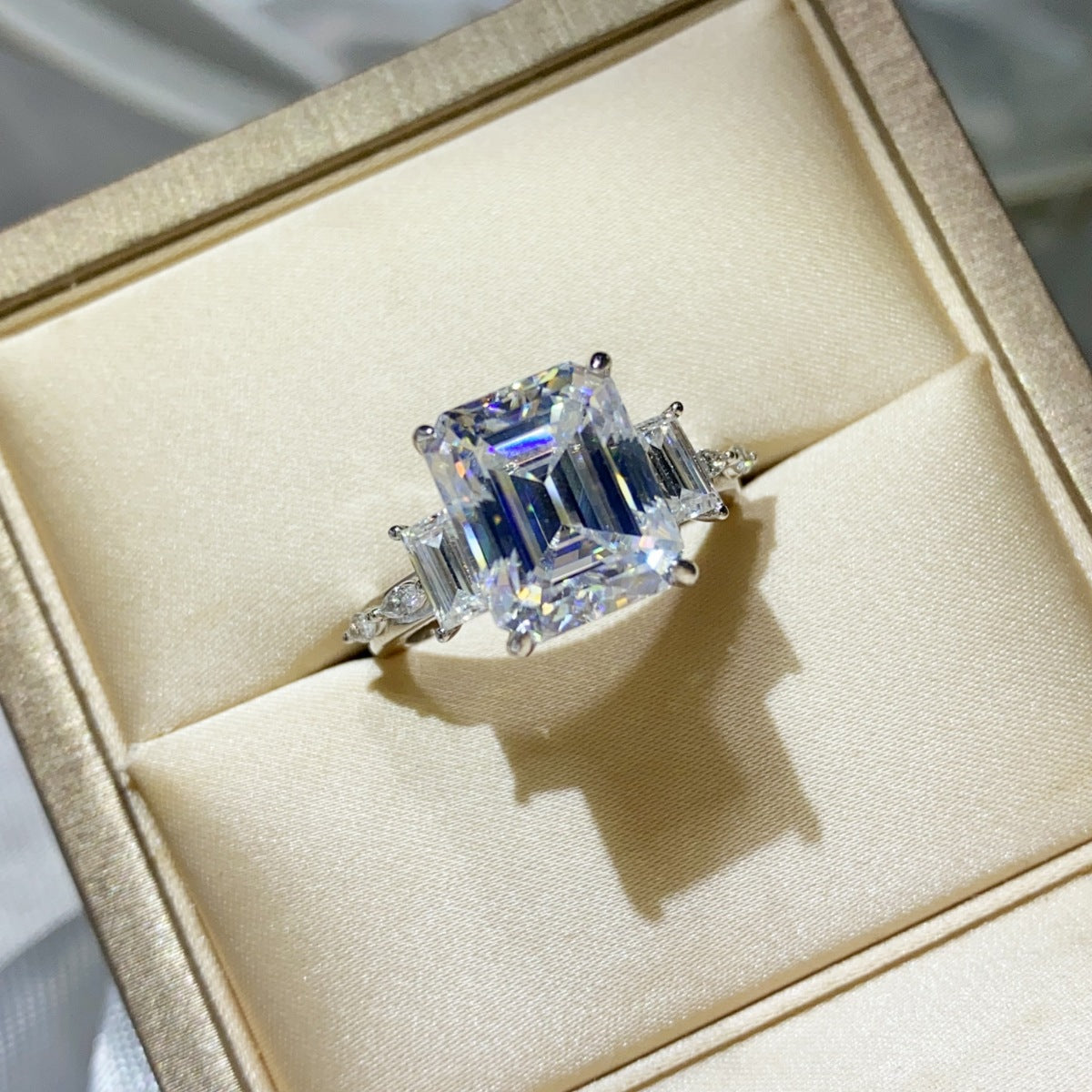 Sterling silver ring with a 5-carat moissanite gemstone, showcasing a sparkling, elegant jewelry design.