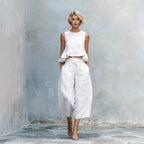 Women’s linen-blend sleeveless two-piece set with ruffled detailing by Plush Fashion Hub, featuring a stylish top and matching skirt.
