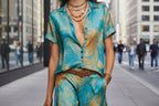 Women’s bohemian printed resort two-piece casualwear set by FitiqueFit with 3/4 sleeve shirt and matching pants, vibrant and comfortable.