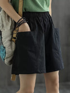 Casual elastic waist shorts in neutral color, featuring a relaxed fit and comfortable fabric, perfect for everyday wear.