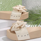 Women's chic bow decor platform sandals by Trendsi, featuring comfortable flat walking shoes with stylish bow accents.