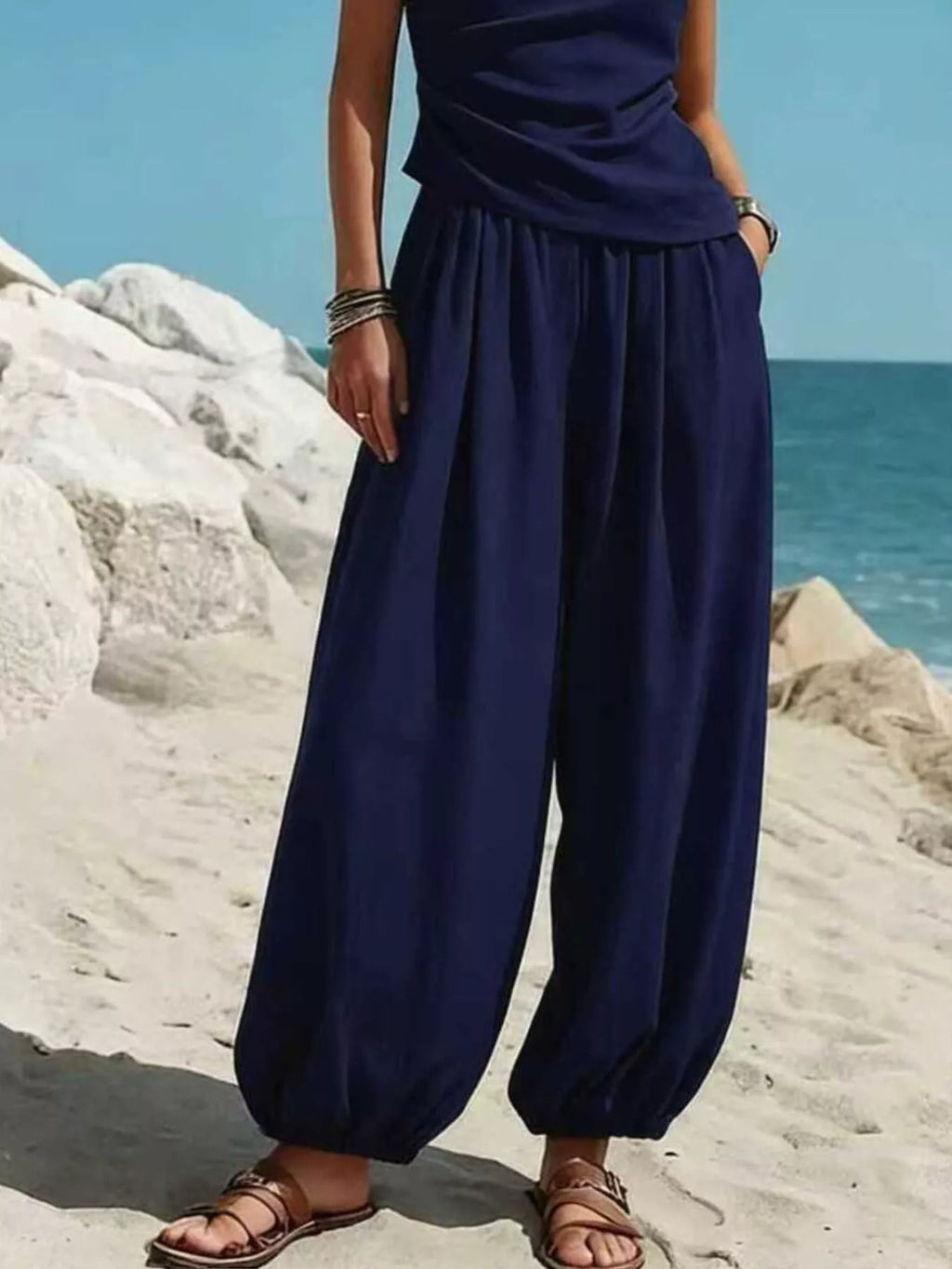 Plus size one-shoulder top and wide-leg pants set by Plush Fashion Hub, featuring a stylish, coordinated piece pants set.