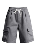 Plus size men's drawstring pocketed shorts from Trendsi, featuring a comfortable fit and casual style.