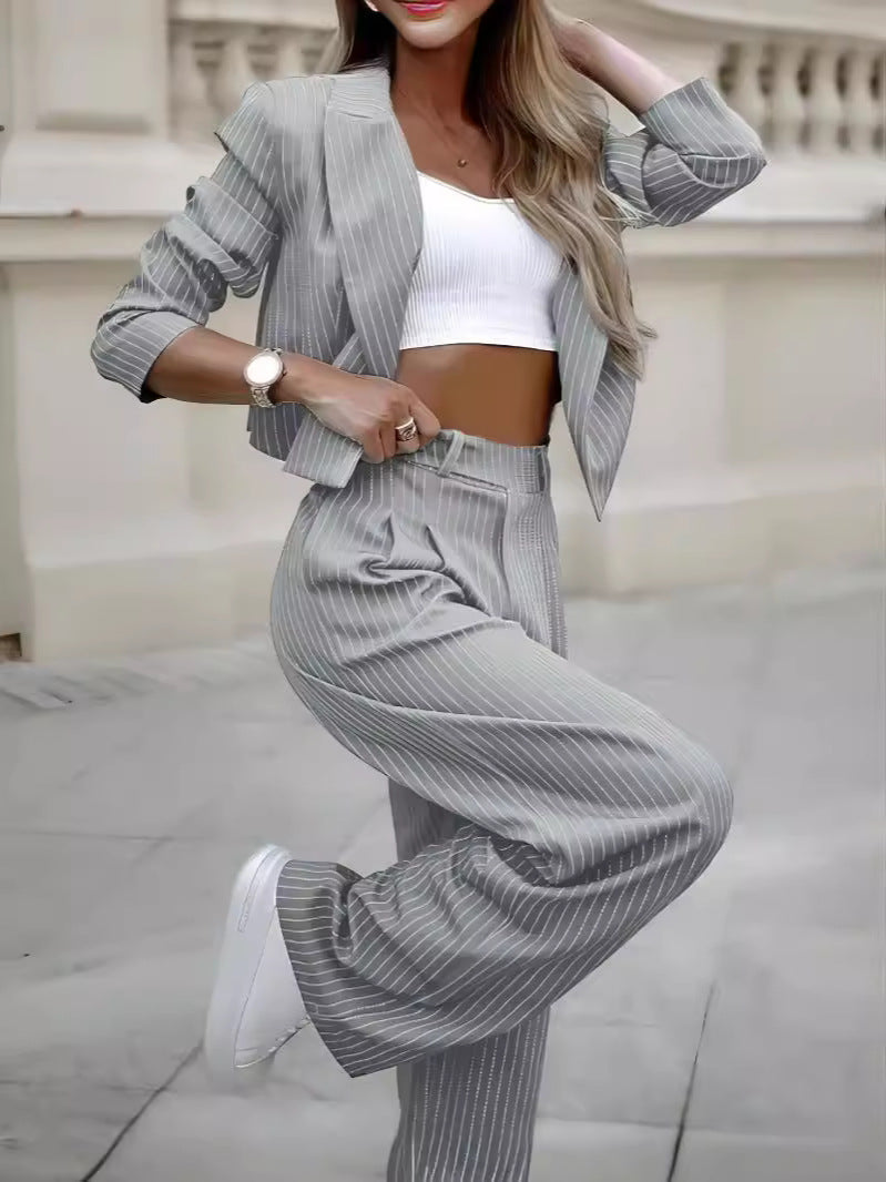 Women's striped spring suit by LadyShow featuring a casual cropped long sleeve top and straight pants, perfect for stylish everyday wear.