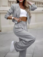 Women's striped spring suit by LadyShow featuring a casual cropped long sleeve top and straight pants, perfect for stylish everyday wear.