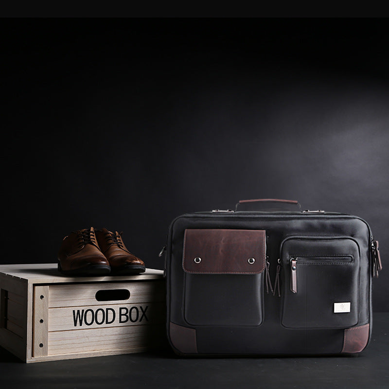 Plush Fashion Hub laptop bag with shoulder strap, portable briefcase design, made of durable material for carrying laptops and accessories.