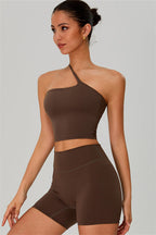 Fitglutes activewear crop top and shorts 2-piece set, one-shoulder design, perfect for gym and workout sessions.