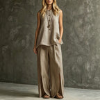 Women's sleeveless tank top and slit wide-leg pants two-piece casual set by Plush Fashion Hub, featuring relaxed fit and stylish design.