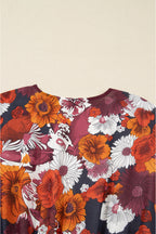 Flowy Marianna Sleeve Mini Dress by Threaded Pear featuring a floral pattern, short sleeves, and lightweight fabric.