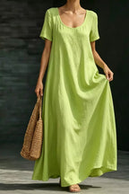 Plus size casual loose short sleeve maxi dress by Plush Fashion Hub, full-length lightweight dress with a relaxed fit.