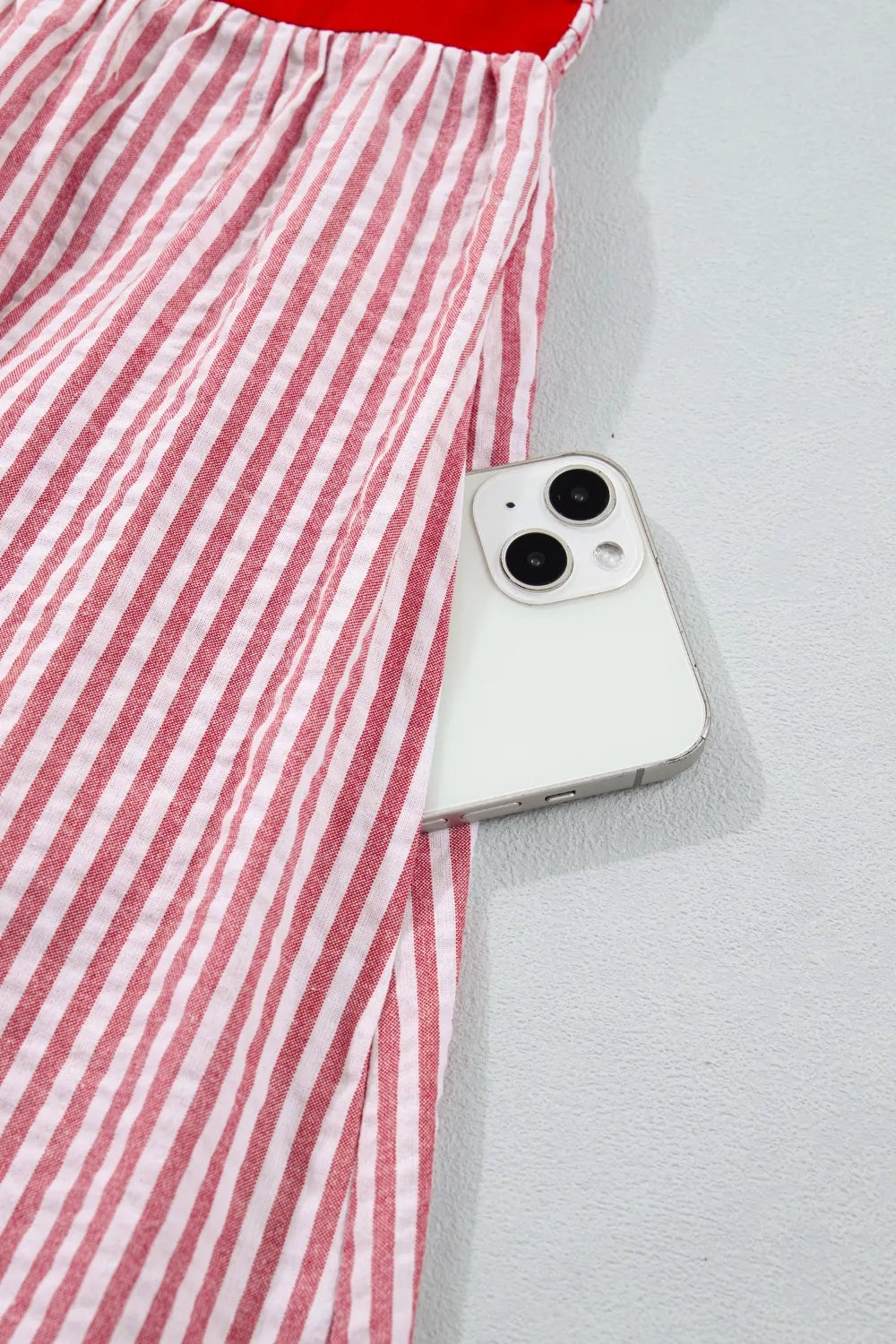Plush Fashion Hub stripe bow knot maxi dress with contrast trim, high waist, and ruffle hem, featuring bow straps and elegant design