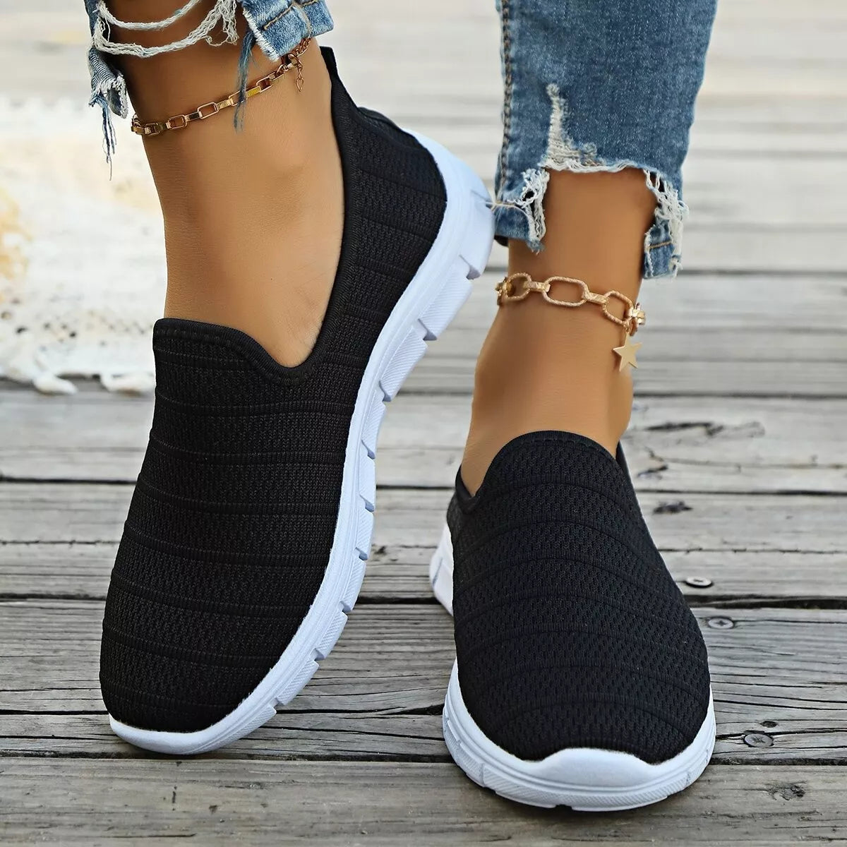 Women's breathable mesh slip-on casual walking flats by Trendsi, featuring lightweight comfort and stylish design.