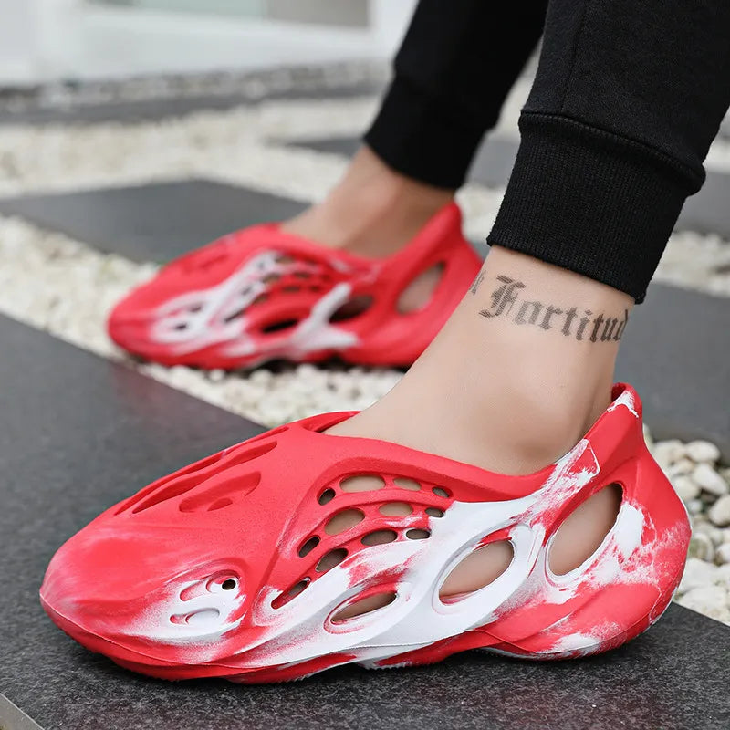 Trendsi hollow-out flat sandals with open toe design, featuring stylish cut-out details and comfortable flat sole for casual wear.