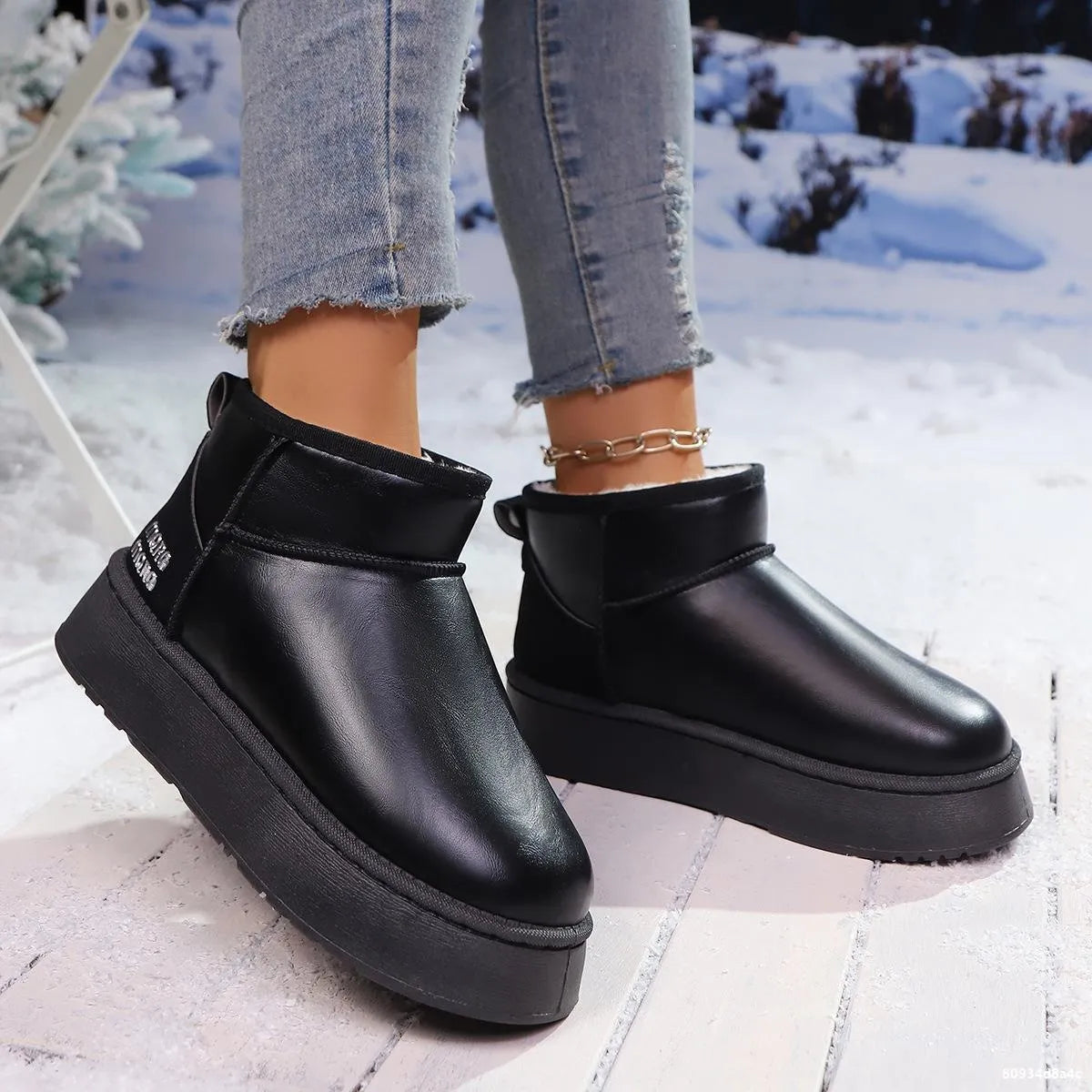 Faux-fur platform ankle boots by Trendsi featuring a stylish design with a plush fur upper and chunky heel.