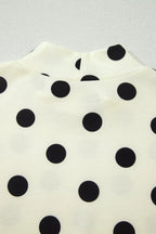 Polka dot print high neck dolman top by Plush Fashion Hub, featuring a relaxed fit and stylish design.