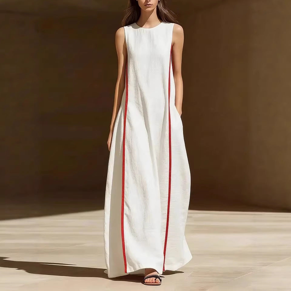 Women's linen sleeveless striped maxi dress by FitiqueFit, featuring a loose fit and casual style, shown hanging on a rack.
