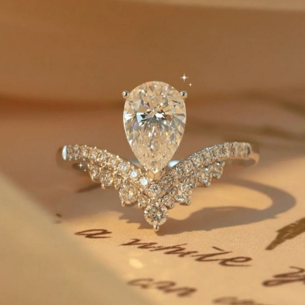 Sterling silver moissanite ring with 1.5 carats of sparkling stones, featuring a sleek band and elegant design.