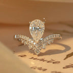 Sterling silver moissanite ring with 1.5 carats of sparkling stones, featuring a sleek band and elegant design.