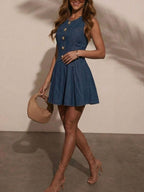 Women's sleeveless denim mini dress with button-front closure and stretchy cotton blend fabric, casual summer dress by Trendsi.
