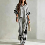 Women's short-sleeve shirt and loose pants two-piece set from Plush Fashion Hub, shown in lightweight fabric with a relaxed fit.
