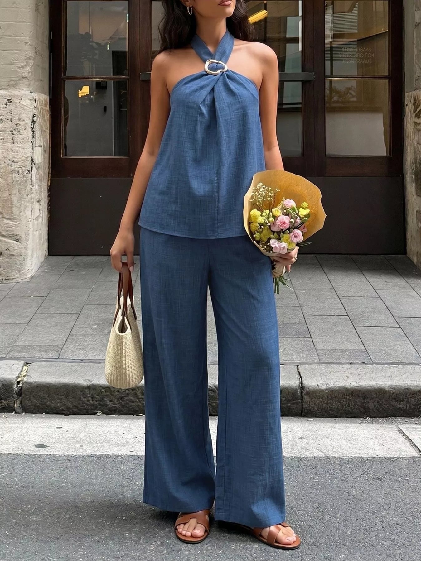 Plush Fashion Hub two-piece halter neck top and wide-leg pants set, featuring stylish, coordinated fashion for women.