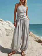 Plus size Plush Fashion Hub one-shoulder top with wide-leg pants set, stylish and comfortable piece pants set for women.