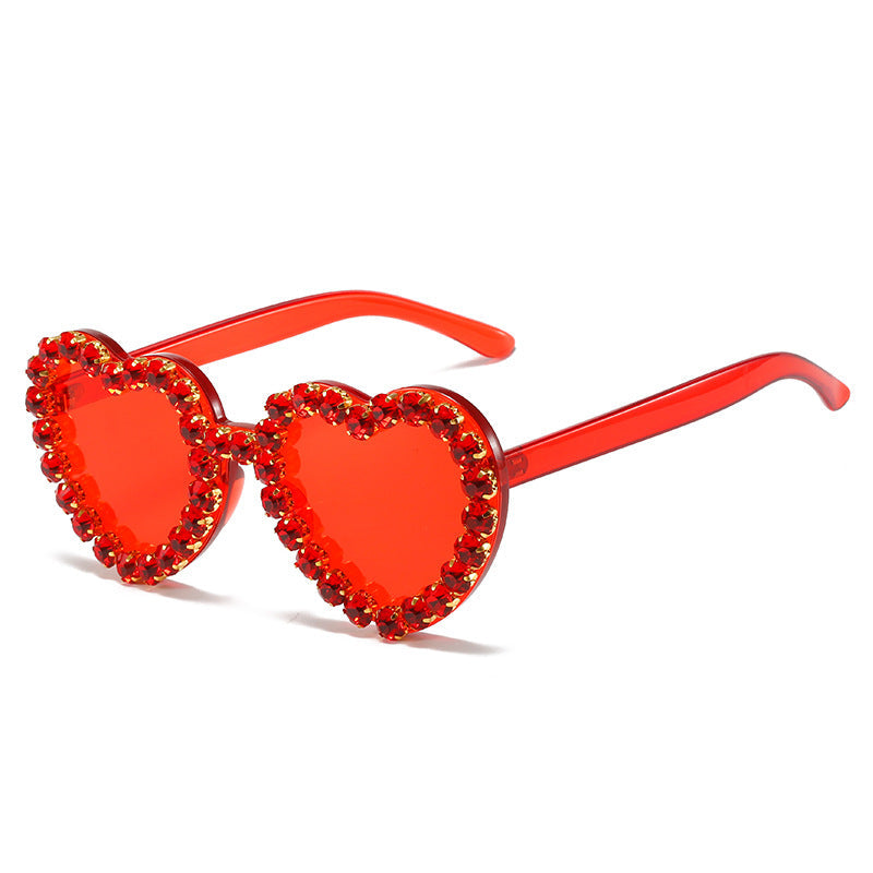 Peach heart-shaped rhinestone sunglasses by Plush Fashion Hub featuring Y2K INS style eyewear with playful, glamorous design.
