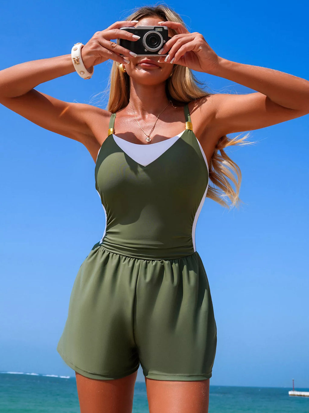 Color block adjustable strap women's one-piece swimsuit by Trendsi, featuring vibrant color blocks and a flattering fit.