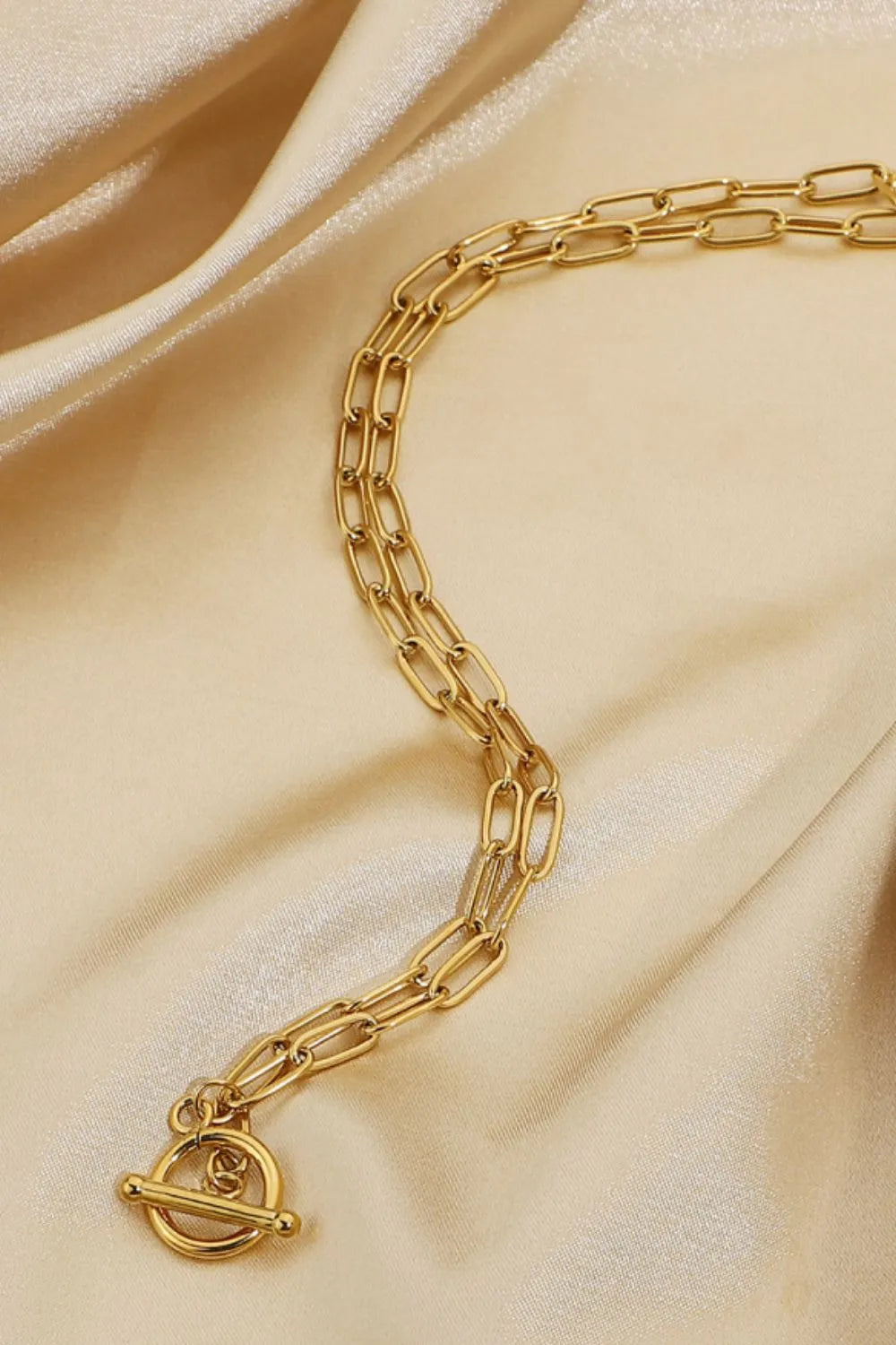 Stainless steel chain necklace from Plush Fashion Hub featuring a sleek, modern design with interlinked metal chain links.