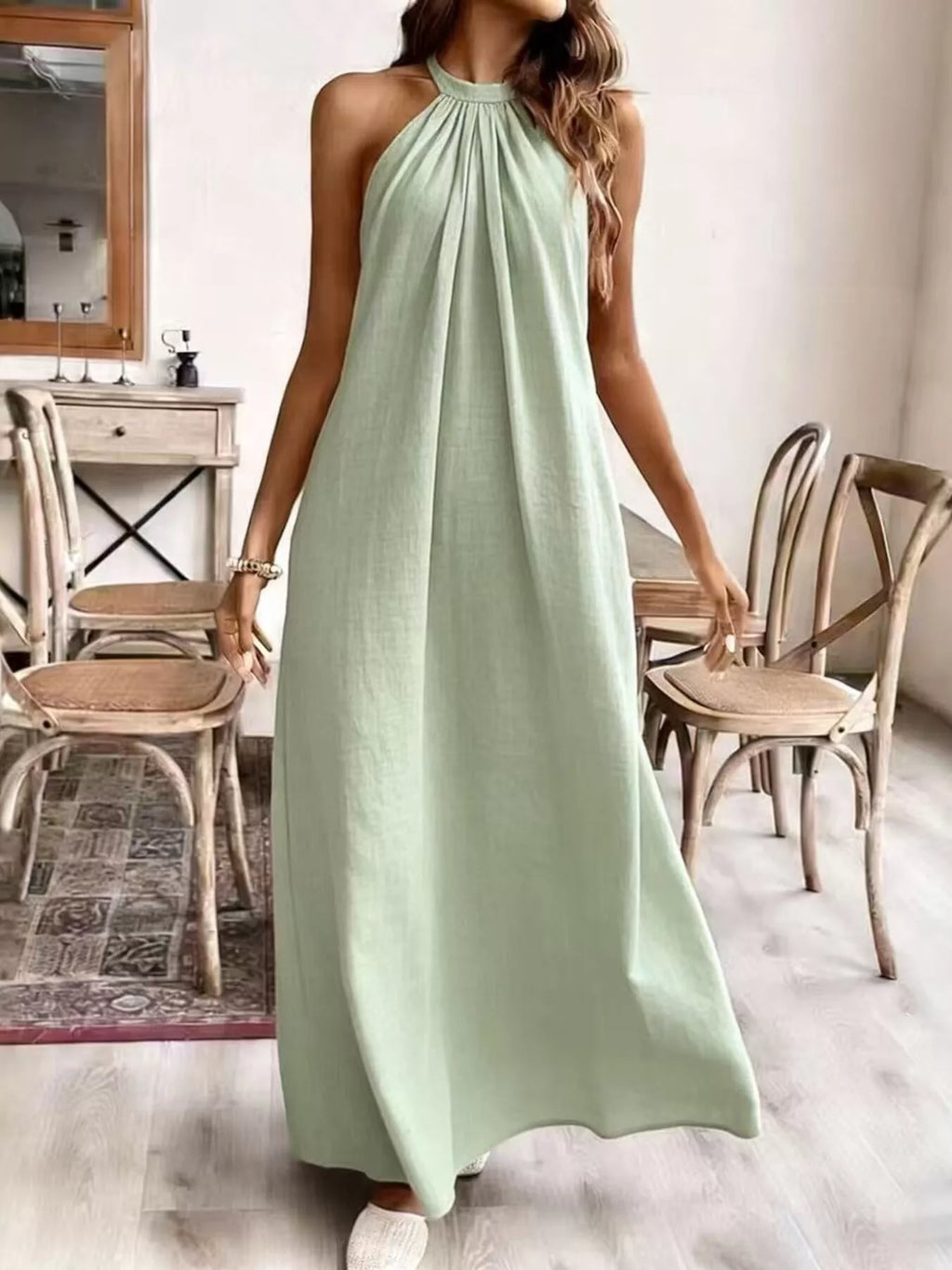 Elegant halter neck maxi dress by Shopimist featuring flowing fabric and a fitted bodice, suitable for summer or formal occasions.