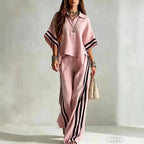 Women's short-sleeve shirt and loose pants two-piece set by Plush Fashion Hub, featuring casual, comfortable matching clothing in soft fabric.