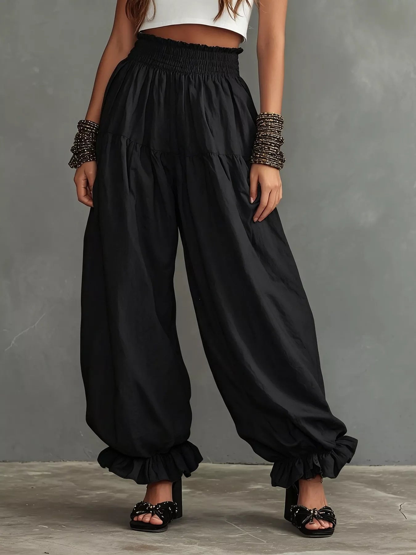 Plus size full smocked ruffle hem wide-leg pants by Plush Fashion Hub, featuring flowy fabric and stylish ruffle details.