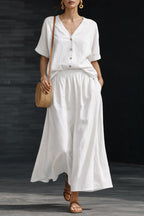 Plush Fashion Hub women's casual V-neck button-up top and long skirt set, shown on a model, in soft, stylish fabrics.