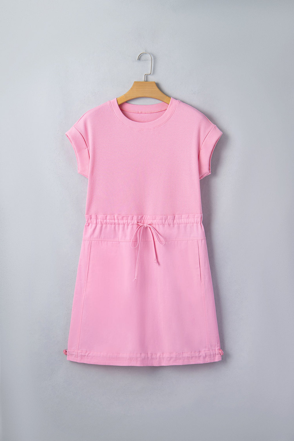 Threaded Pear Ayra Patchwork Drawstring Mini Dress featuring a vibrant patchwork design and adjustable drawstring waist.