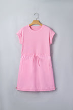 Threaded Pear Ayra Patchwork Drawstring Mini Dress featuring a vibrant patchwork design and adjustable drawstring waist.