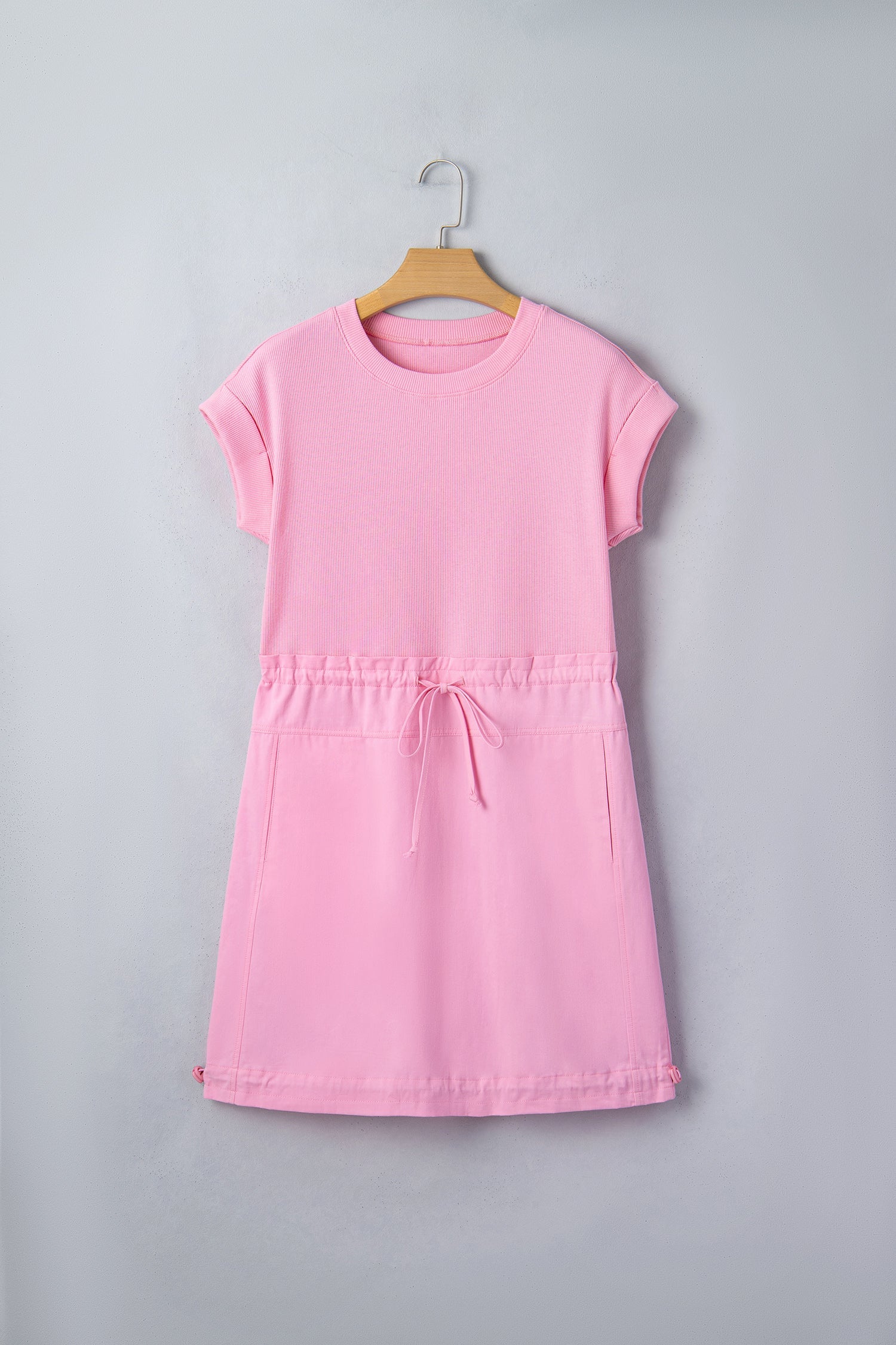 Threaded Pear Ayra Patchwork Drawstring Mini Dress featuring a vibrant patchwork design and adjustable drawstring waist.