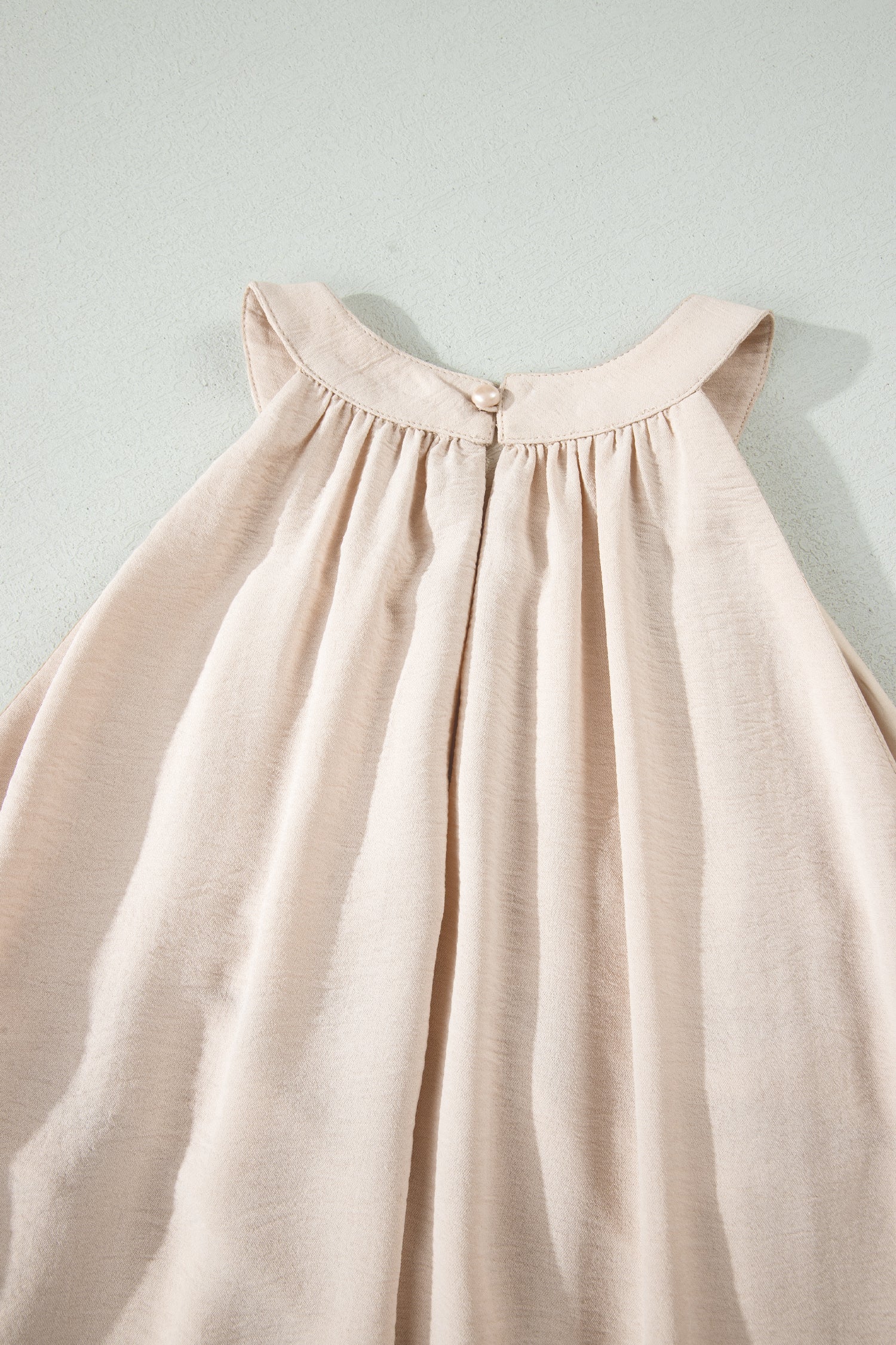 Light blue Ensley Loose Halter Maxi Dress by Threaded Pear featuring a flowy design and halter neckline, ideal for summer wear.