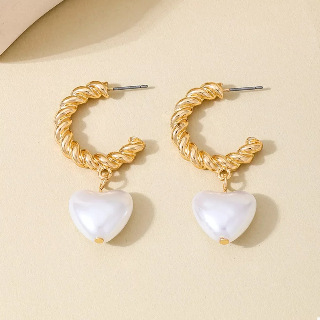 18K gold-plated C-hoop heart earrings with smooth finish, showcasing a stylish and elegant design suitable for everyday wear.