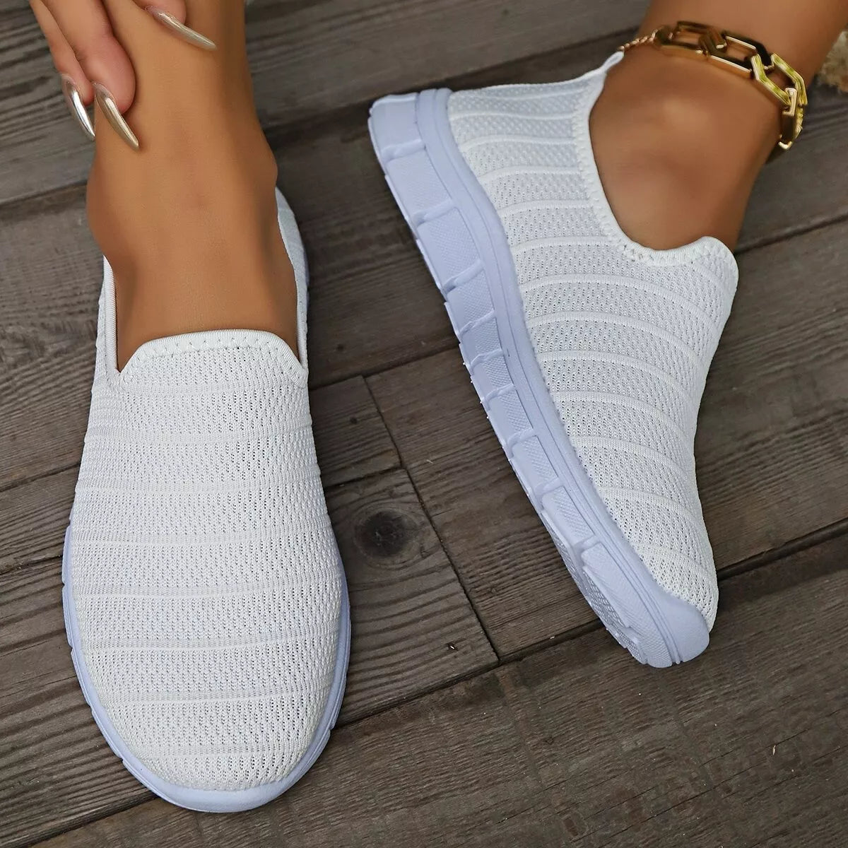 Women's breathable mesh slip-on casual walking flats by Trendsi, lightweight and comfortable for everyday wear.