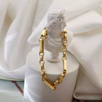 18K gold-plated chunky chain link bracelet from Shopimist, featuring large interlocking links and a shiny gold finish.