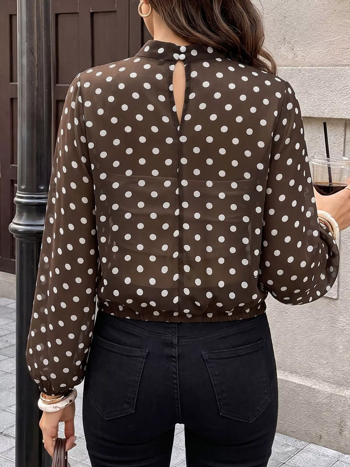 Polka dot mock neck long sleeve blouse from Trendsi, featuring a stylish pattern and classic fit.