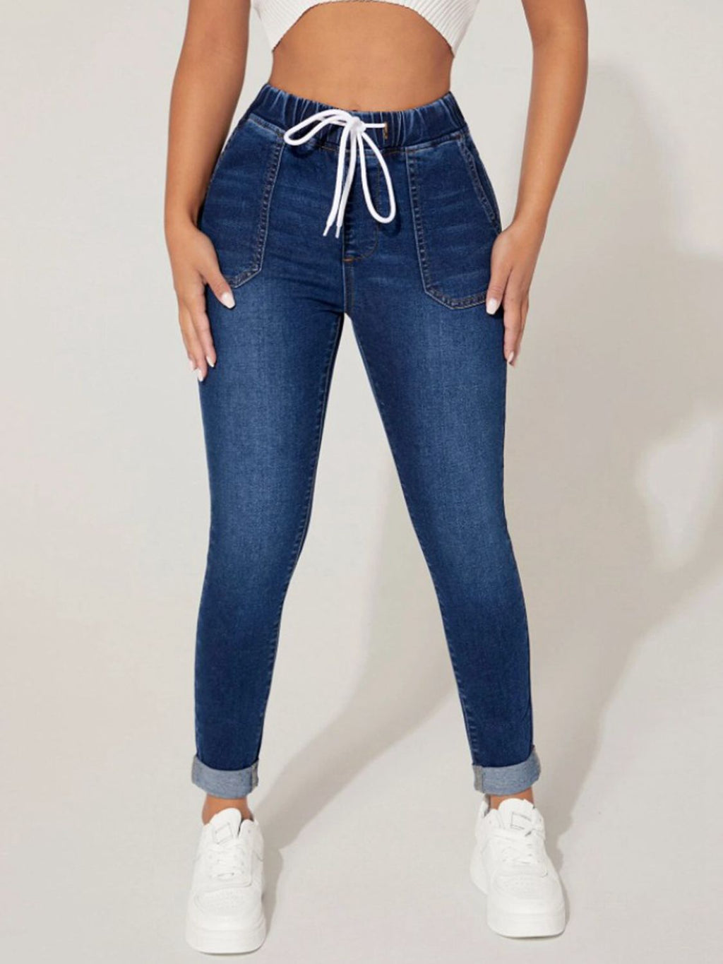 Plush Fashion Hub drawstring cropped denim jeans with a high waist and relaxed fit, shown on a model against a white background.