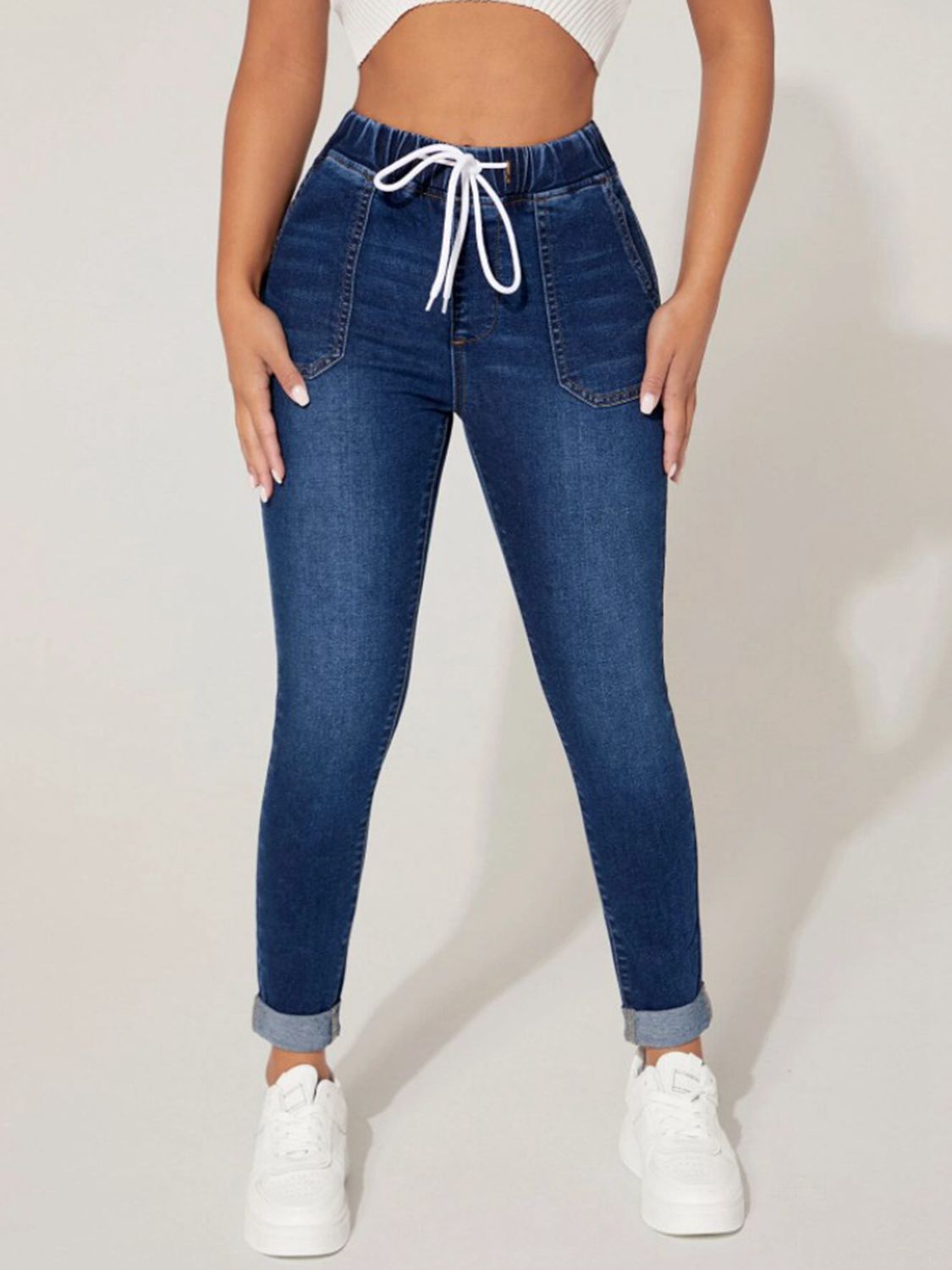 Plush Fashion Hub drawstring cropped denim jeans with a high waist and relaxed fit, shown on a model against a white background.