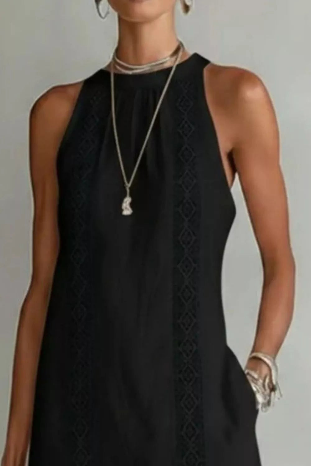 Women's sleeveless side slit maxi dress with pockets by Plush Fashion Hub, flowing fabric and stylish design in this elegant dress.