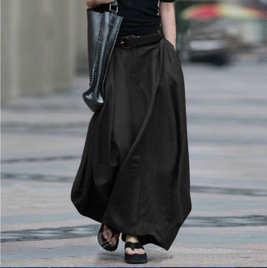 Women's high-waist flared maxi skirt in solid cotton linen fabric with pockets, by Plush Fashion Hub.