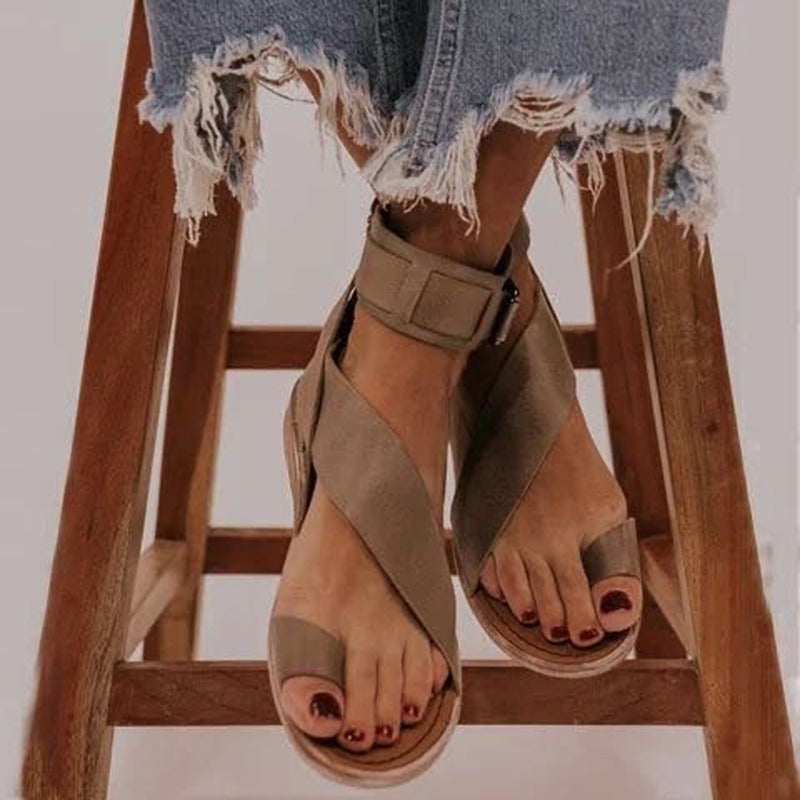 Plus size Roman style women's buckle toe flat sandals by Plush Fashion Hub, featuring comfortable slip-on design and stylish details.