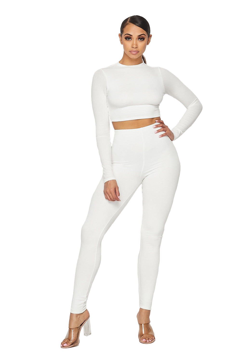 Two-piece cropped top and legging set by The House of Stylez, featuring stylish matching athletic wear in vibrant colors.