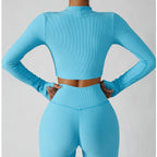 Seamless yoga activewear set with jacket, sports bra, and leggings in black from Plush Fashion Hub, designed for comfortable movement.