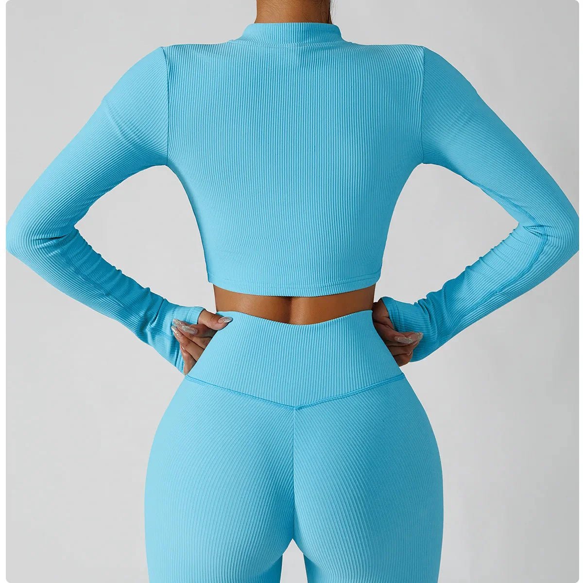 Seamless yoga activewear set with jacket, sports bra, and leggings in black from Plush Fashion Hub, designed for comfortable movement.